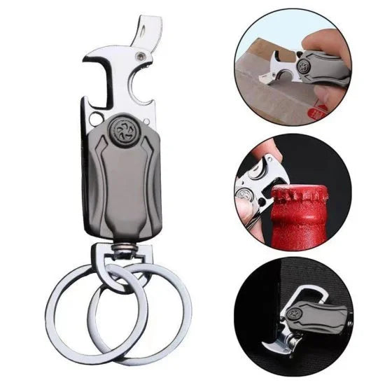 A grey metallic 5-in-1 keychain spinner multi-tool, shown with inset images demonstrating its use as a box opener, bottle opener, and bag clip.
