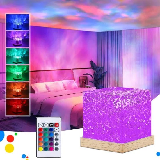 A cube-shaped Ocean Wave Water Ripple Lamp illuminating a bedroom with colorful light, displayed next to its multi-color remote control.