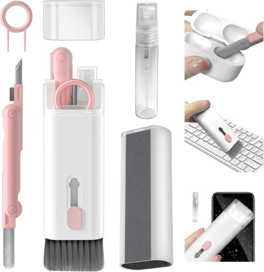 A multi-functional electronics cleaning kit in white and pink, featuring a main body with a retractable keyboard brush and microfiber screen wipe, a folding earbud cleaning pen, a keycap puller, and a mini spray bottle. Inset images show the tools being used to clean a wireless earbud case, a computer keyboard, and a smartphone screen.