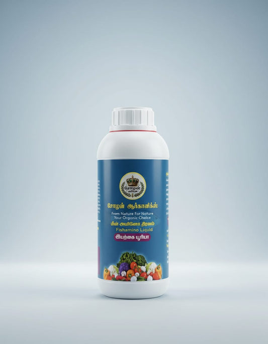 A white plastic bottle of Cholan Organics Fishamino Liquid, featuring a blue label with Tamil and English text and an illustration of assorted fresh vegetables at the bottom, set against a light grey-blue background.