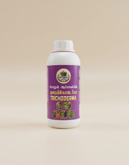 A white plastic bottle of Chozhan Organics Trichoderma with a purple label. The label features the product name in both Tamil and yellow English text, a crown logo, and small images of various crops, all set against a plain light beige background.